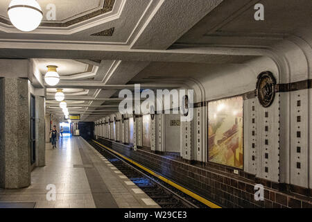 Berlin Dahlem District,Breitenbachplatz U-Bahn underground railway station interior, Platform, decorative tiles, medallions & old paintings. Stock Photo