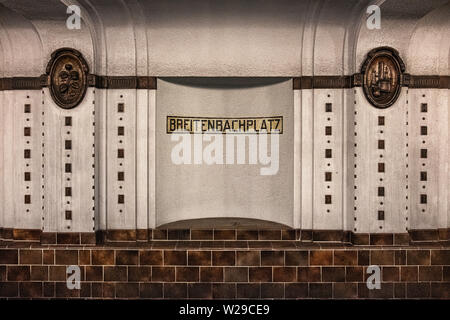 Berlin Dahlem District,Breitenbachplatz U-Bahn underground railway station interior, decorative tiles, medallions & station name. Stock Photo