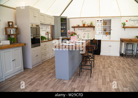 90th Kent County Show, Detling, 6th July 2019. A cream and grey display kitchen. Stock Photo