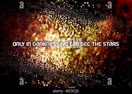 Text only in darkness we can see the stars Quote in tripped macro background Stock Photo