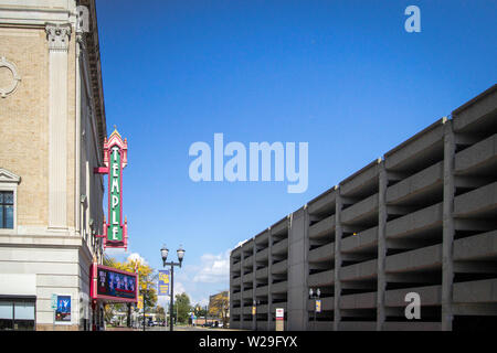 Saginaw, Michigan, USA - October 9, 2018: The streets of downtown Saginaw, Michigan with the historic Temple Theater in the foreground. Stock Photo