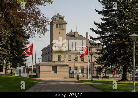 Army Corps Of Engineers Building at the Soo Locks in Sault Ste Marie Michigan. The locks are one of the busiest shipping channels in the world. Stock Photo