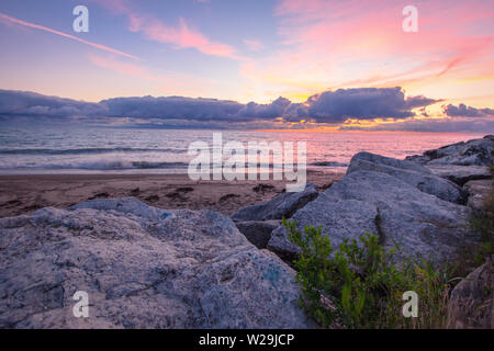 Sunrise Over Rocky Lake Michigan Shoreline Cave Point County Park Door ...