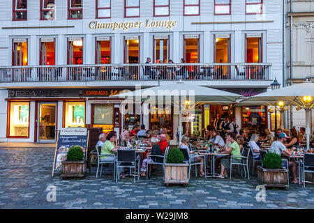 People  in Dresden Restaurant Champagner Lounge outside the bar on at Frauenkirche Square, Beumarkt Dresden Germany Stock Photo