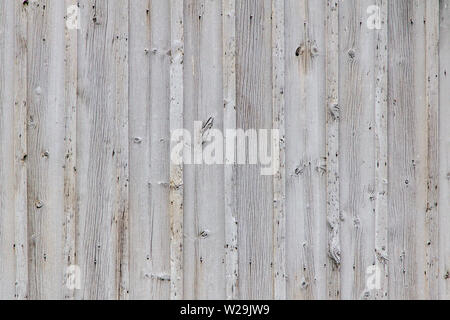 Textured Grain Barn Wood Background. Grey weathered wooden barn wall background in horizontal orientation. Stock Photo