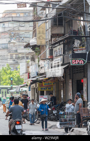Saigon, Vietnam - June 2017: people shopping in busy asian city market, Saigon, Vietnam. Stock Photo