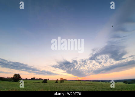 cloudy colourful sunrise in north London Stock Photo