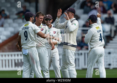 London, UK. 07th Jul, 2019. Harry Podmore of Kent Cricket Club (2nd from left) celebrates after taking the wicket of Scott Borthwick of Surrey Cricket Club with team mates during Specsavers County Championship Fixture between Surrey vs Kent at The Kia Oval Cricket Ground on Sunday, July 07, 2019 in LONDON ENGLAND. Credit: Taka G Wu/Alamy Live News Stock Photo