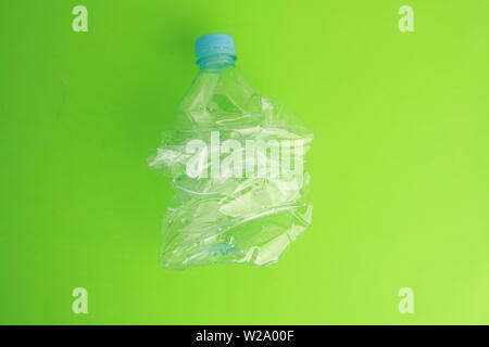 Empty plastic water bottle scaled for recycling Stock Photo