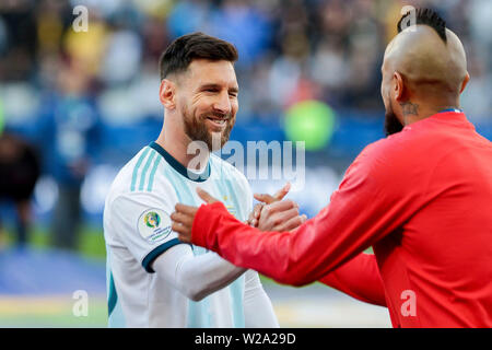 Sao Paulo, Brazil. 07th July, 2019. 6th July 2019, Arena Corinthians Stadium, Sao Paulo, Brazil; Copa America international football, 3rd-4th playoff final, Argentina versus Chile; Leonel Messi of Argentina greets Arturo Vidal of Chile Credit: Action Plus Sports Images/Alamy Live News Stock Photo