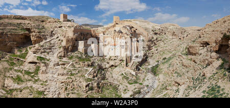 Panoramic aerial wide angle landscape of Holy Lavra of Saint Sabbas the Sanctified, known in Arabic as Mar Saba in the Judean desert in Israel. West B Stock Photo