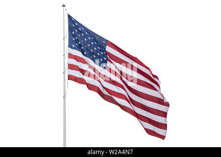 American flag on a pole waving, white background. US of America symbol sign isolated on white Stock Photo