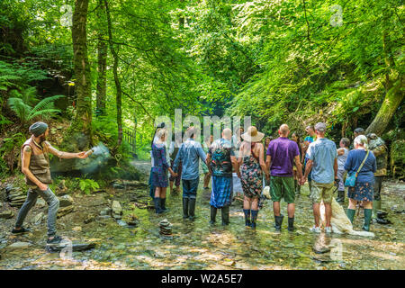 A 'Hand Fasting' ceremony takes place at St Nectan's Glen, near Tintagel, Cornwall. Handfasting is a Neopagan ceremony between couples. Stock Photo