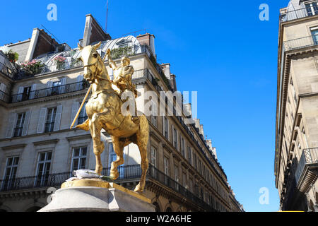 Gilded bronze equestrian statue 1874, depicting Saint Jeanne d Arc Joan of Arc . Place des Pyramides, Paris. Stock Photo