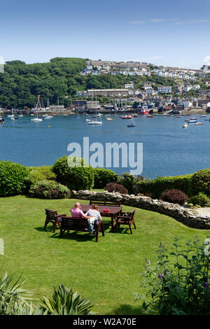 A lovely place to relax with a drink and enjoy the wonderful view across the River Fowey to the little village of Polruan Stock Photo