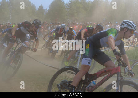 VALLNORD, ANDORRA  - JULY 7 2019:  CYCLIST in the MERCEDES-BENZ UCI MTB WORLD CUP 2019 - XCO Vallnord, Andorra on July 2019 Stock Photo