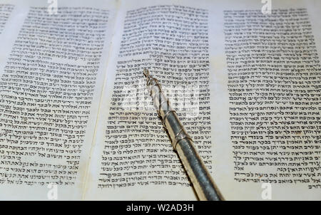 NEW YORK NY March 2019. Hebrew religious Torah parchment old scroll book Stock Photo