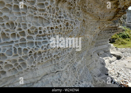 Erosion patterns sculpted by wind and water  on Jurassic rock at Elgol Isle of Skye, Scotland Stock Photo