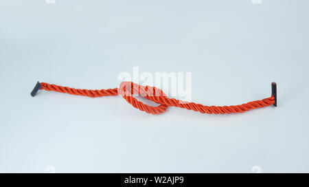 Long straight red rope isolated on white Stock Photo - Alamy