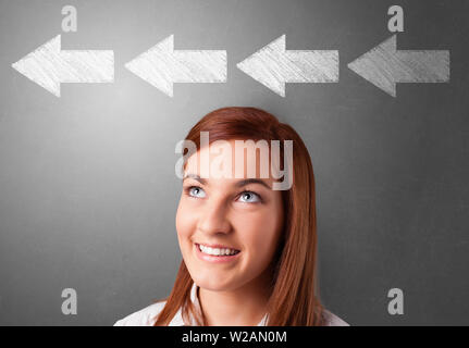 Business person choosing between several directions Stock Photo