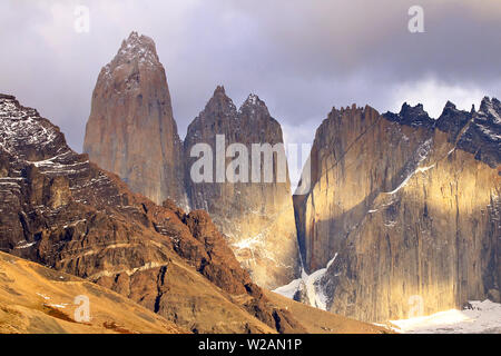 Evening light and wild weather on Las Torres at the Torres del Paine National Park, Magallanes in Chilean Patagonia. Stock Photo