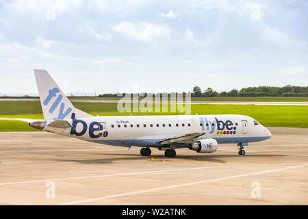 CARDIFF WALES AIRPORT - JUNE 2019: Flybe Embraer E175 plane taxiing for take off from Cardiff Wales Airport. Stock Photo
