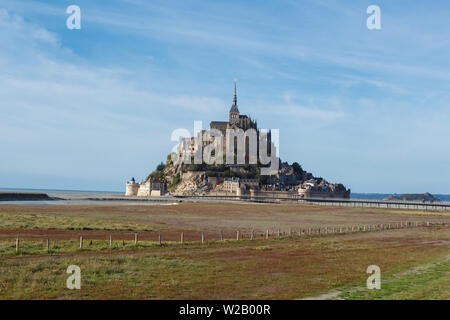 Mont Saint-Michel at low tide during a sunny day in autumn Stock Photo