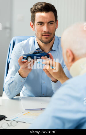 team of automotive design engineers discusses new prototype model Stock Photo