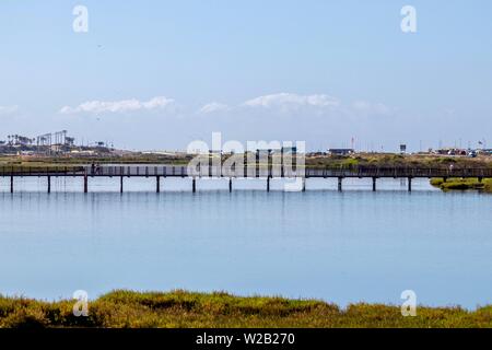 Bridge over water in Bolsa Chica Ecological Reserve Stock Photo