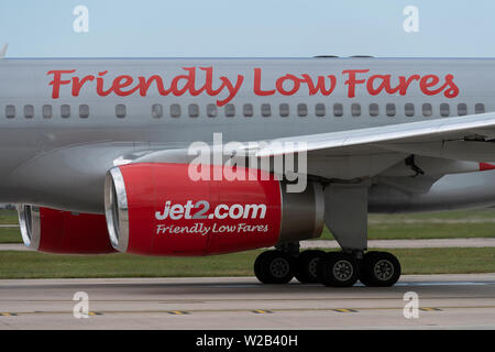 The logo of Jet2.com airliner is clearly seen on the side of an air inlet at Manchester Airport, UK. Stock Photo