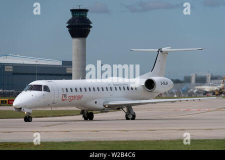 A Loganair Embraer ERJ-145EU taxis on the runway at Manchester Airport, UK. Stock Photo