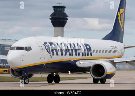 A Ryanair Boeing 737-800 taxis on the runway at Manchester Airport, UK. Stock Photo