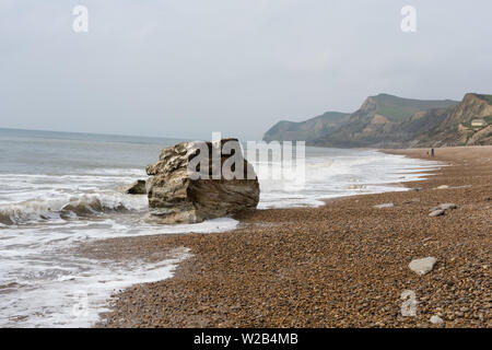 Rock at sea, beach near Eype village, West Bay Stock Photo