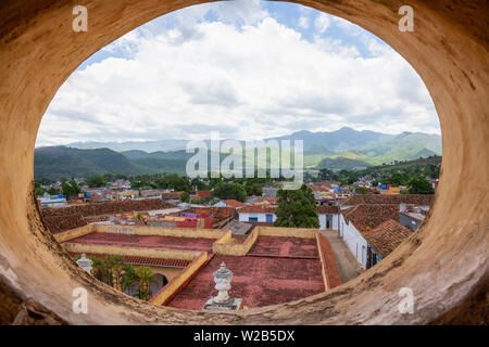 Trinidad, Cuba - June 11, 2019: Window View from a Church in a small Cuban Town during a vibrant sunny day. Stock Photo