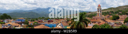 Aerial panoramic view of a small touristic Cuban Town during a sunny and cloudy summer day. Taken in Trinidad, Cuba. Stock Photo