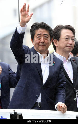 Tokyo, Japan. 7th July, 2019. Japanese Prime Minister and leader of the ruling Liberal Democratic Party (LDP) Shinzo Abe reacts to his supoorters as he delivers a campaign speech for his party candidate Keizo Takemi for the July 21 Upper House election in Tokyo on Sunday, July 7, 2019. Credit: Yoshio Tsunoda/AFLO/Alamy Live News Stock Photo