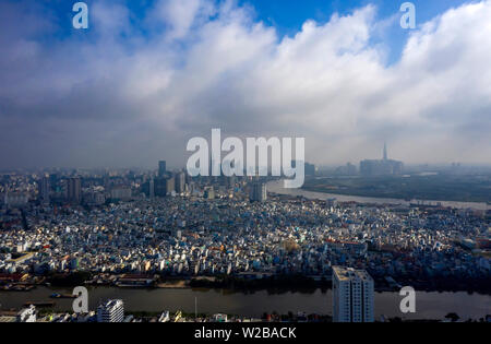 Early Morning Panorama of Ho Chi Minh City Vietnam. Often there is low cloud and mist in the morning at this time of the year. Photo from district 7 Stock Photo