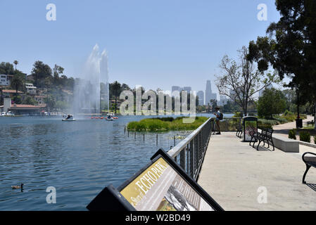 LOS ANGELES, CA/USA  - Jan 3 2016: The iconic Los Angeles Skyline seen from the lake at Echo Park Stock Photo