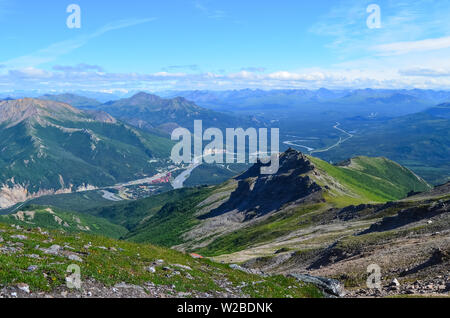 View of Nenana river valley from Mount Healy hike trail with blue sky with white clouds above. Denali National Park Stock Photo