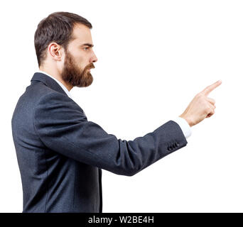 Businessman pointing to something or touching by forefinger. Stock Photo