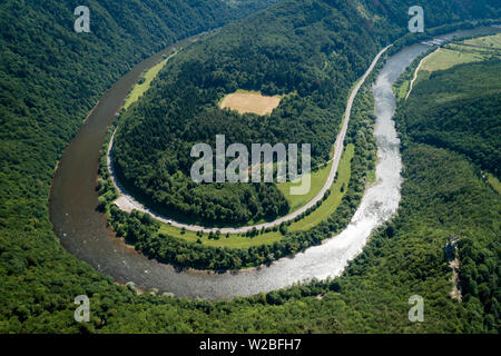 Domasinsky meander of Vah river, Starhrad ruins castle with road around, meadows, forest and hills of Lucanska Mala Fatra mountains, Slovakia