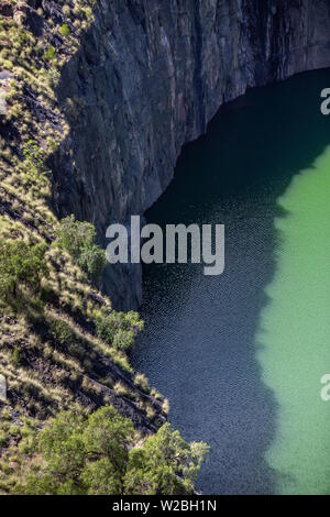 The De Beers diamond mine in Kimberley South Africa being filled with  re-processed mine dump tailings Stock Photo - Alamy