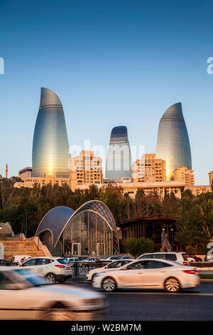 Azerbaijan, Baku, Entrance to Funicular railway and Flame Towers behind Stock Photo