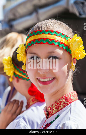 Bulgaria, Central Mountains, Kazanlak, Kazanlak Rose Festival, town produces 60% of the world's rose oil, young girl dancer in traditional costume, NR Stock Photo