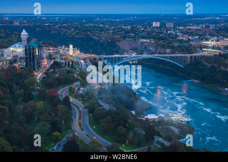 Canada and USA, Ontario and New York State, Niagara, View over Victoria Park towards the Sheraton on the Falls Hotel and Rainbow Bridge Stock Photo