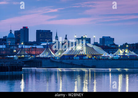 Canada, Quebec, Montreal, Palais de Congres de Montreal, convention Center, Old Port and circus tent from the St. Lawrence River Stock Photo