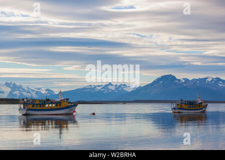 Chile, Magallanes Region, Puerto Natales, tour boats on Seno Ultima Esperanza bay Stock Photo