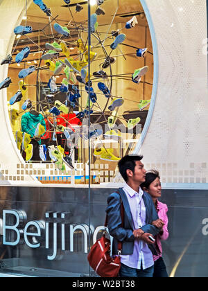 China, Beijing, Pedestrianised Illuminated window display on Wangfujing street, the main shopping street in Beijing Stock Photo