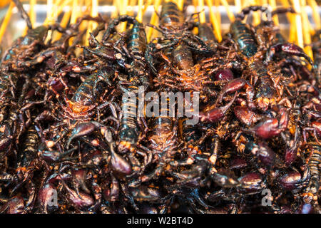 Scorpions on sticks, Donghuamen Night Market, Wangfujing, Beijing, China Stock Photo