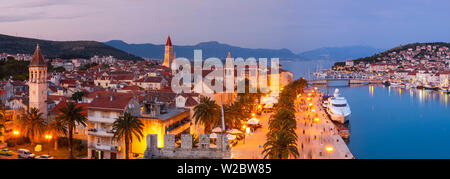 Elevated view over Trogir's Stari Grad (old town) illuminated at dusk, Trogir, Dalmatia, Croatia Stock Photo